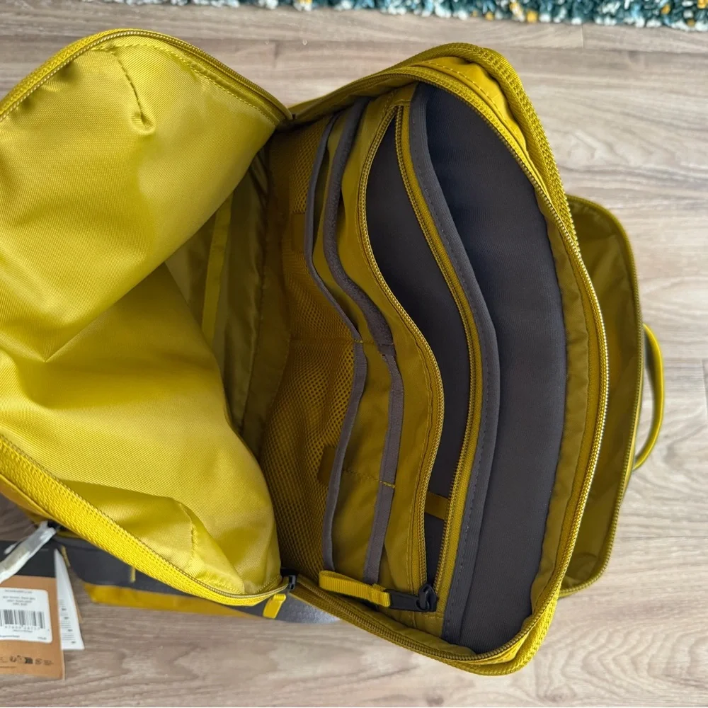 The North Face Men's Yellow Backpack with Gray Accents
